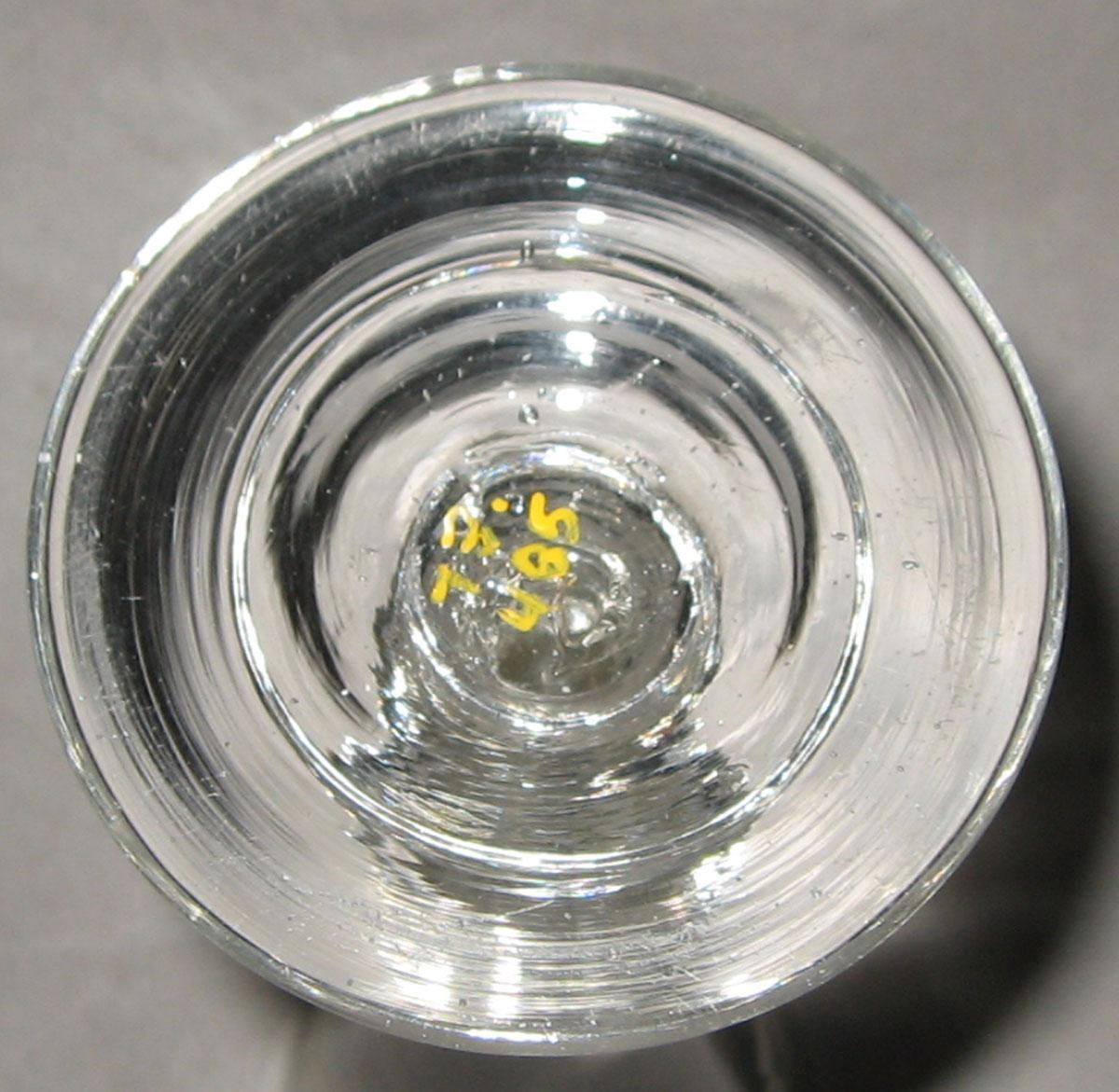 1973.0485 Colorless glass wine glass (underside)