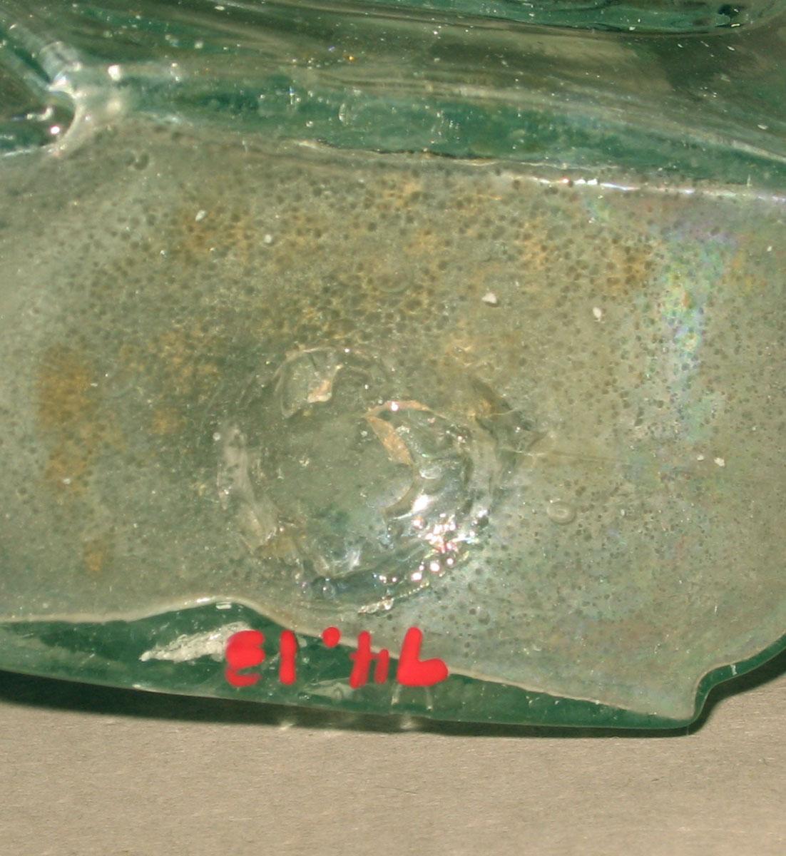 1974.0013 Glass flask (underside)
