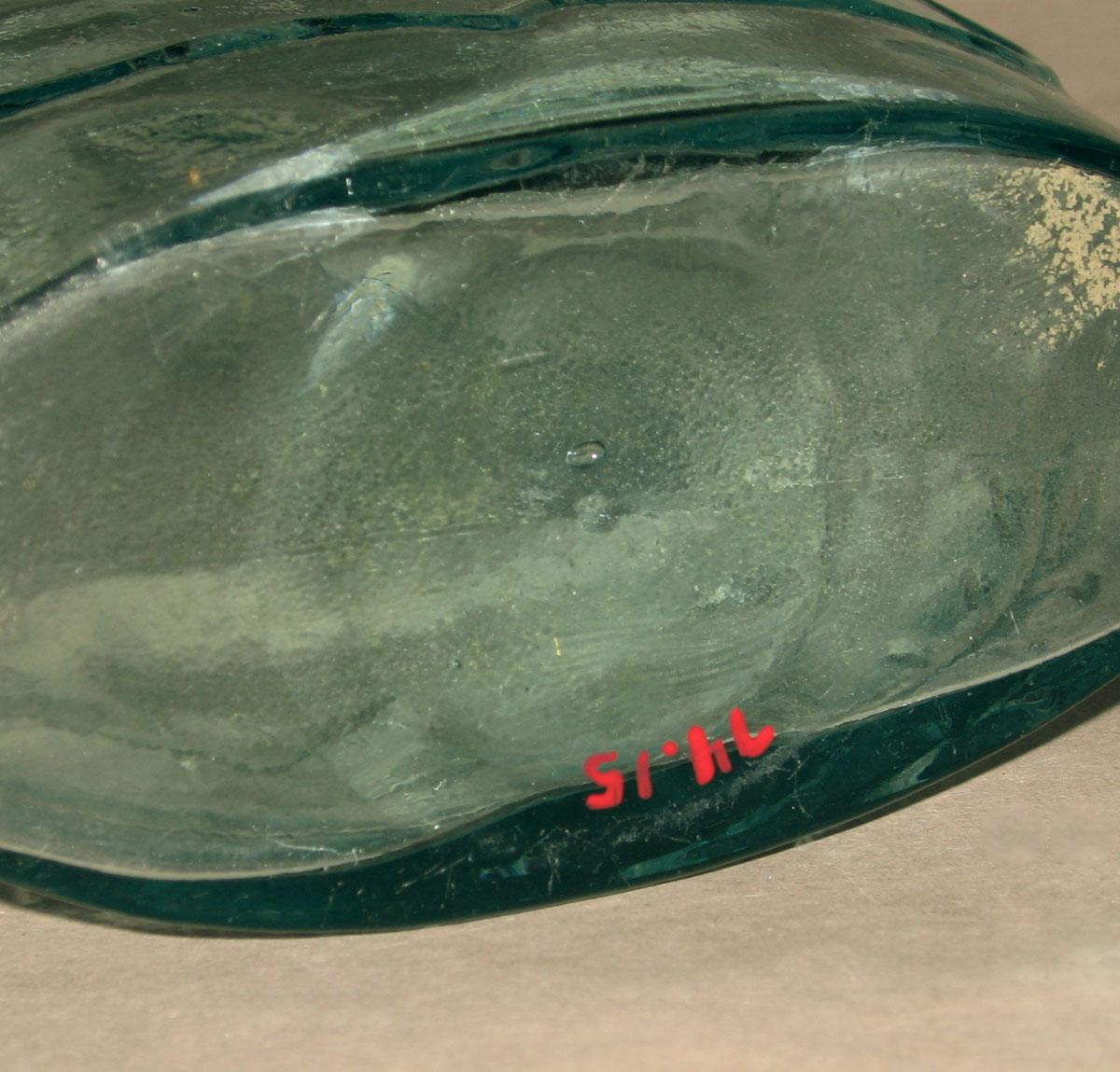 1974.0015 Glass flask (underside)