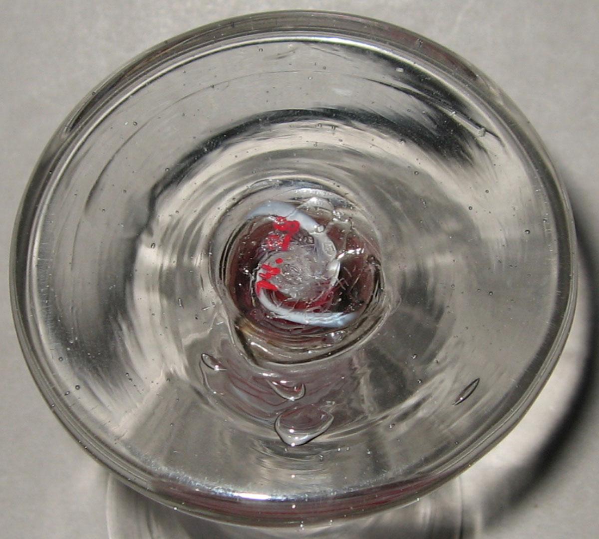 1974.0028 Glass firing glass (underside)