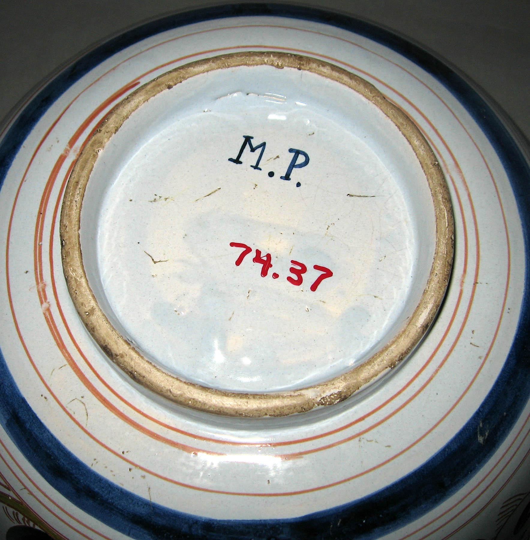 1974.0037 Tin-glazed earthenware punch bowl (underside)