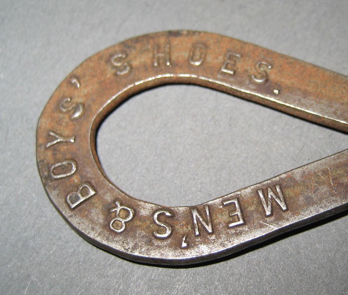 1974.0064.018 Button Hook (inscription 1)