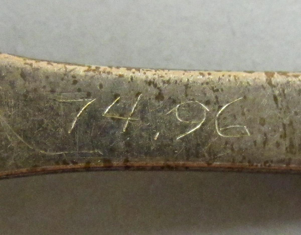 1974.0096 Spoon, inscription