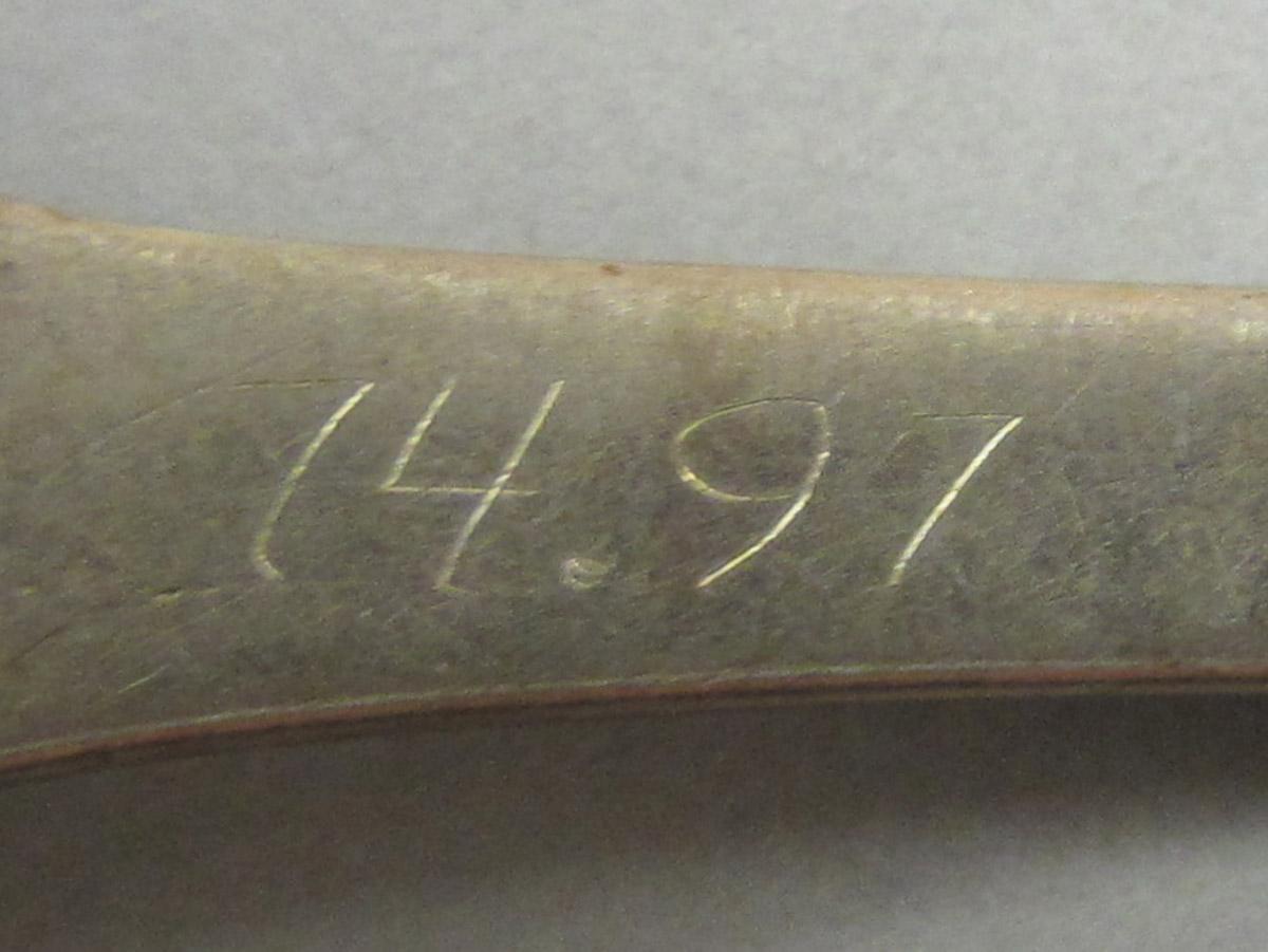 1974.0097 Spoon, inscription