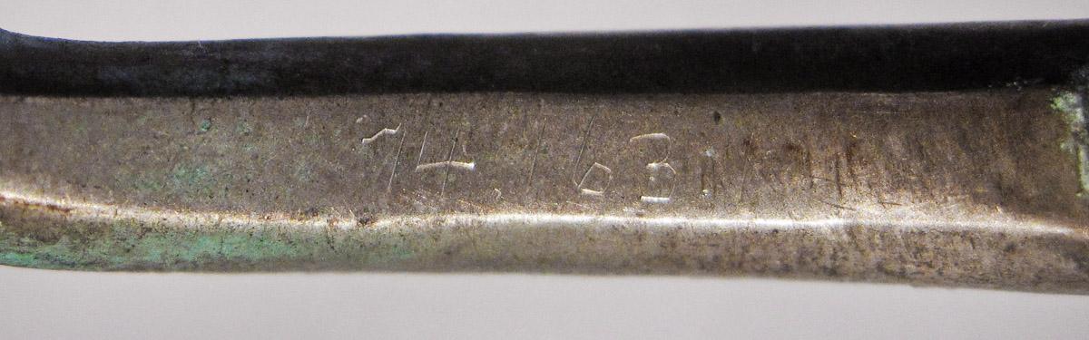 1974.0163.001 Buckle, inscription