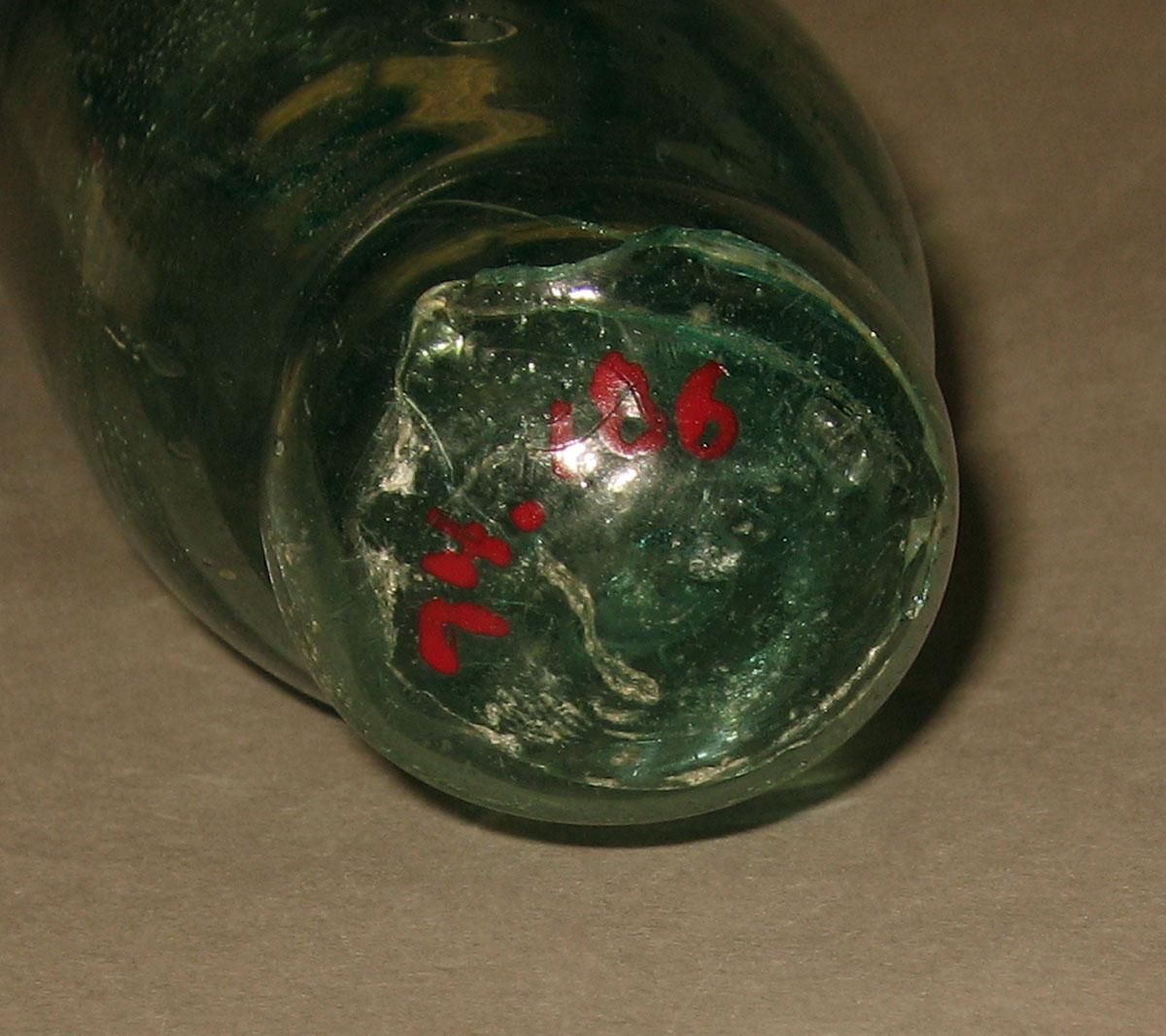 1974.0186 Glass rolling pin (pontil mark)