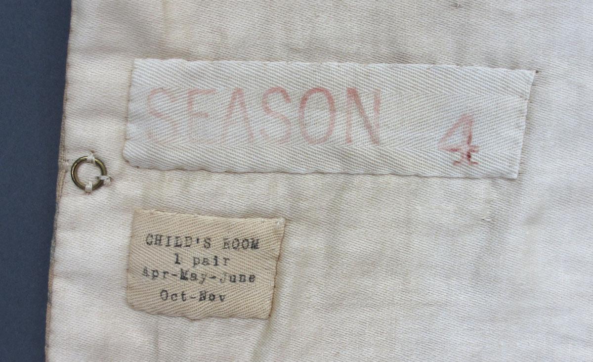 1952.0323 A Window hanging label