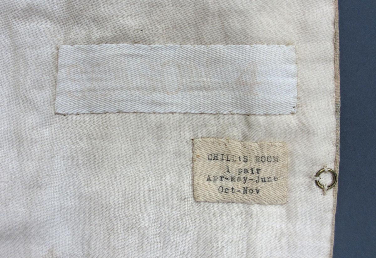 1952.0323 B Window hanging label