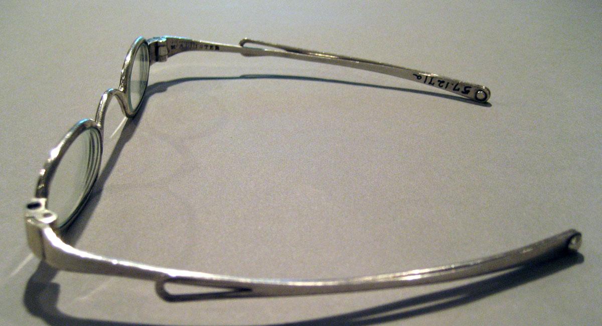1957.1271 A Silver Spectacles side view