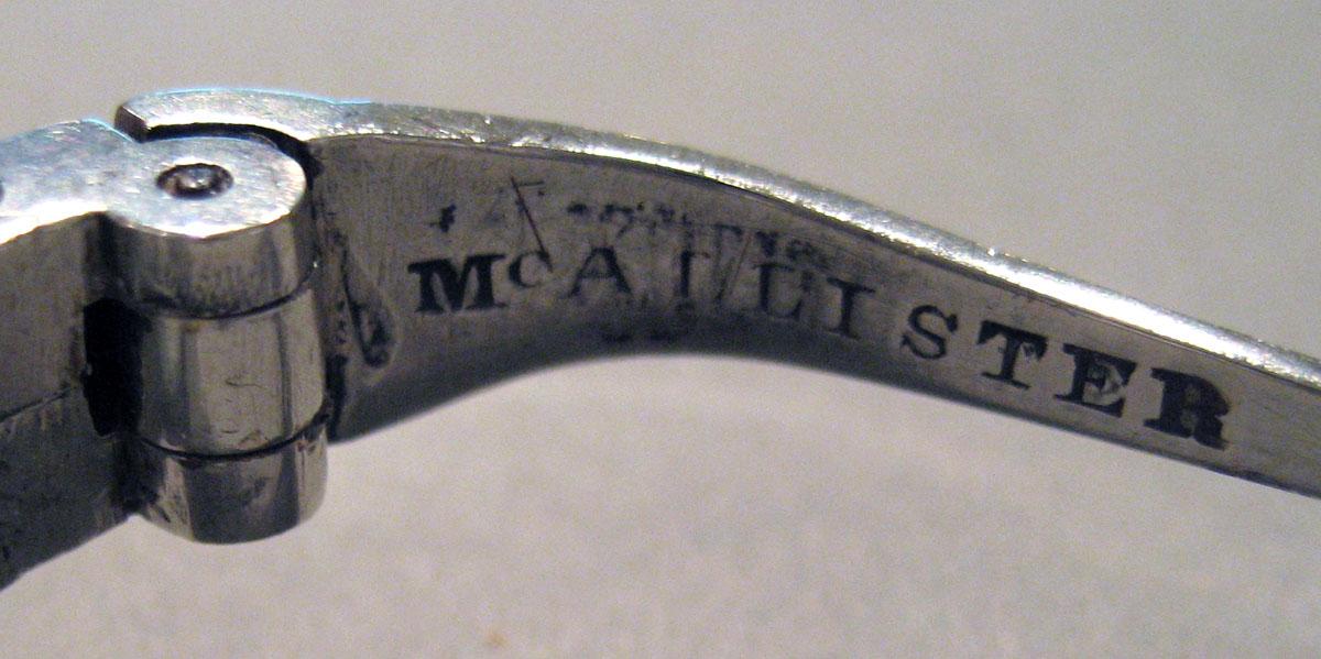 1957.1271 A Silver Spectacles mark 1