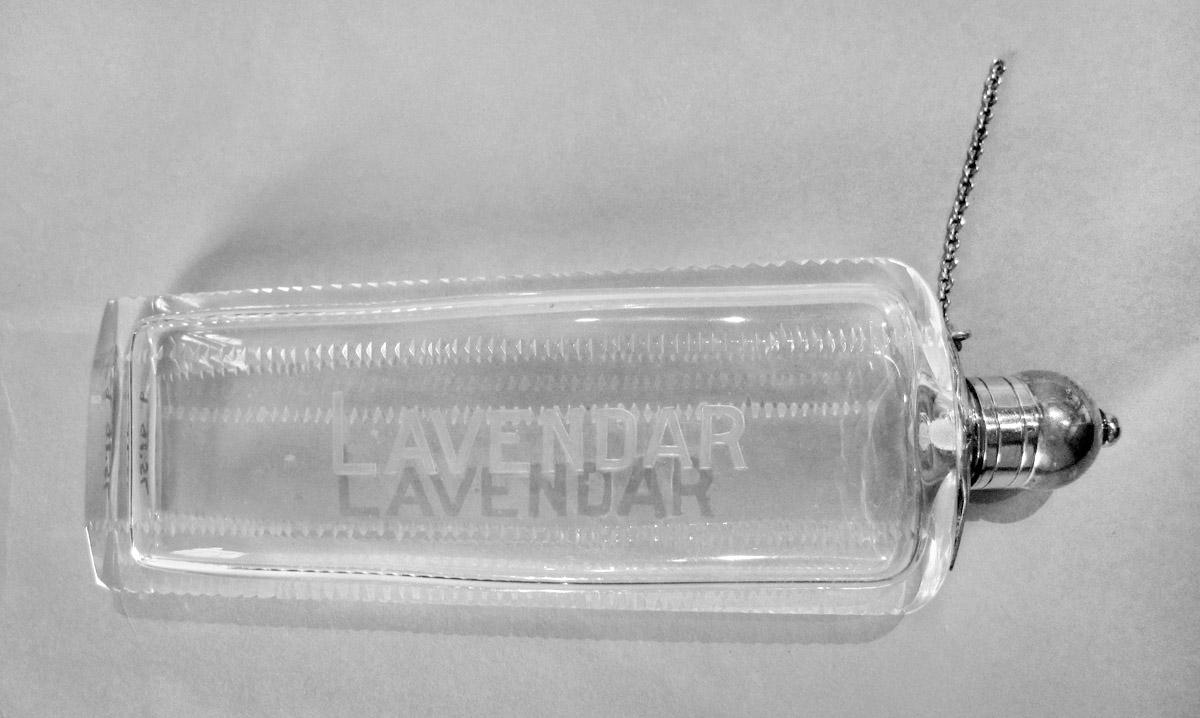 1975.0016 B-D Bottle, side 1