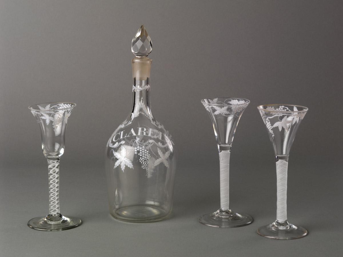 1975.0044.002, 1975.0042, 1975.0043.001, .002 Decanter and wineglasses (view 1)