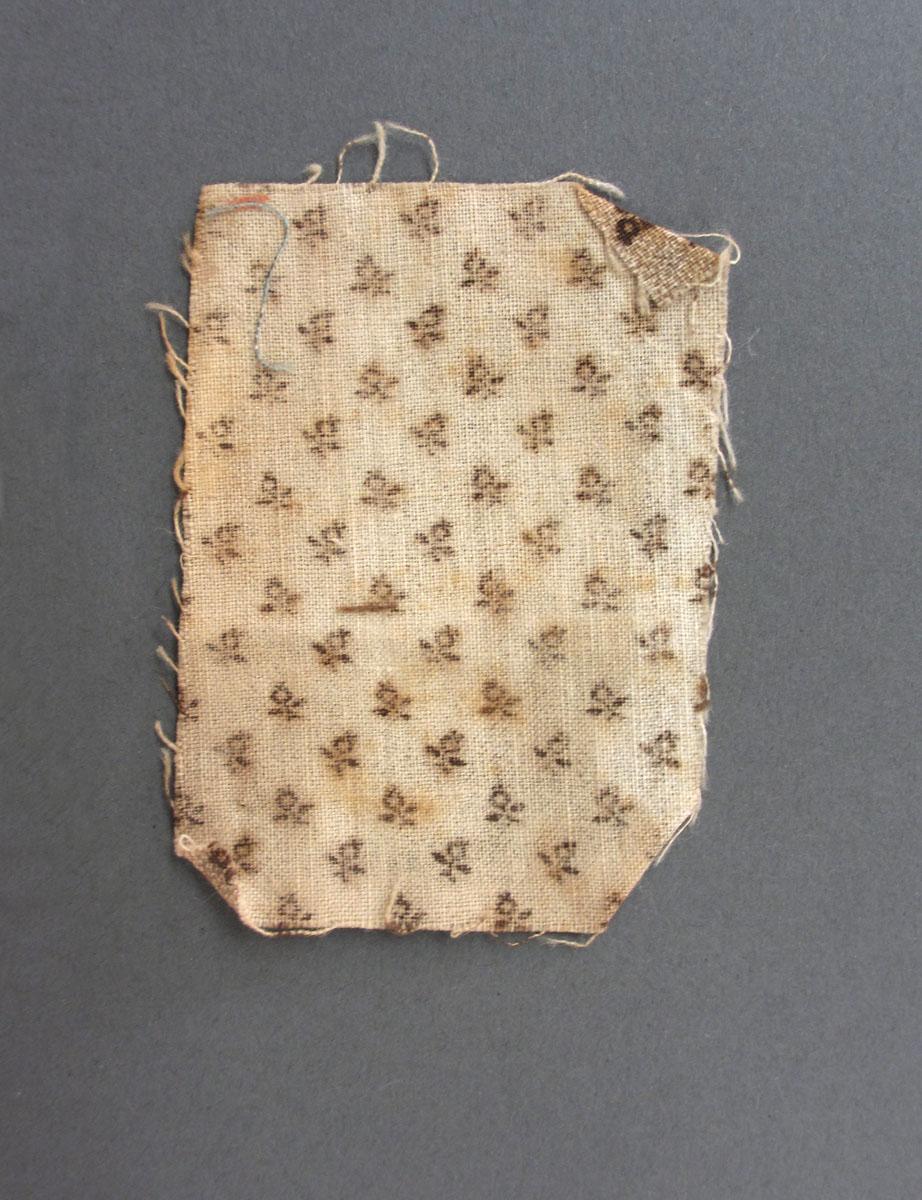 1975.0214.003 A textile, printed, reverse