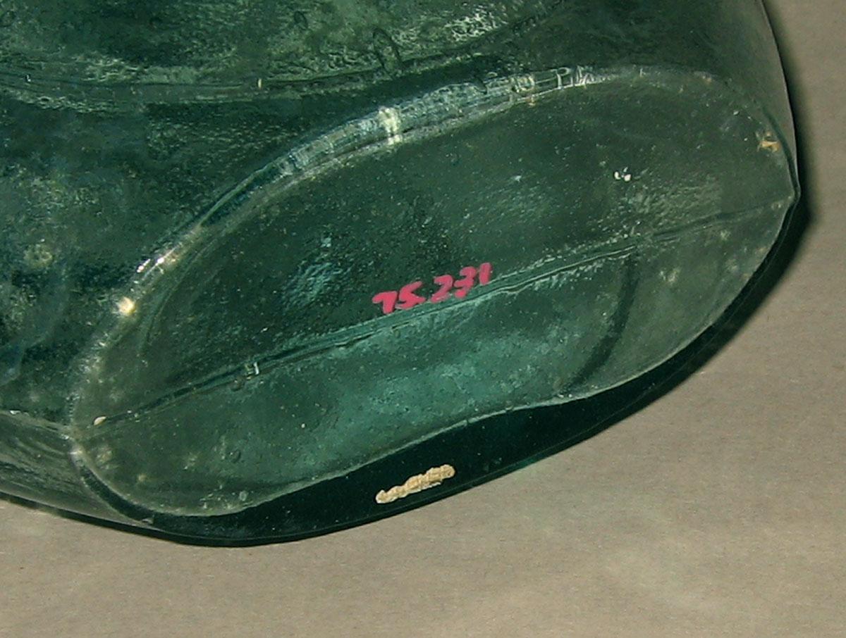 1975.0231 Glass flask (underside)