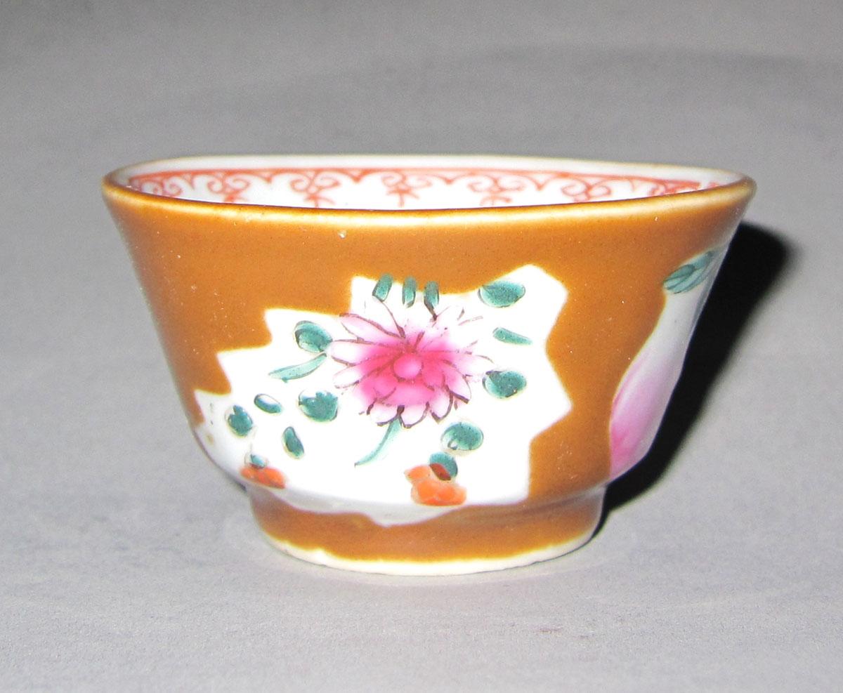 1975.0266 A Porcelain cup face two
