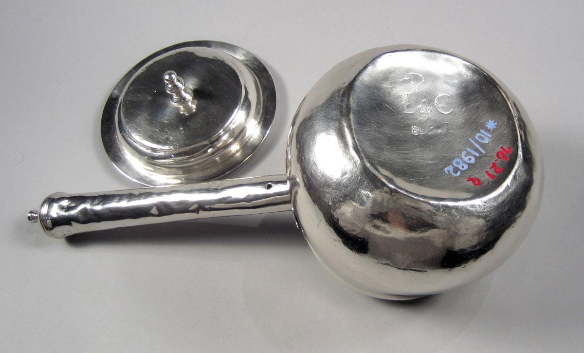 1976.0021 A, B Silver Warmer separate and underside