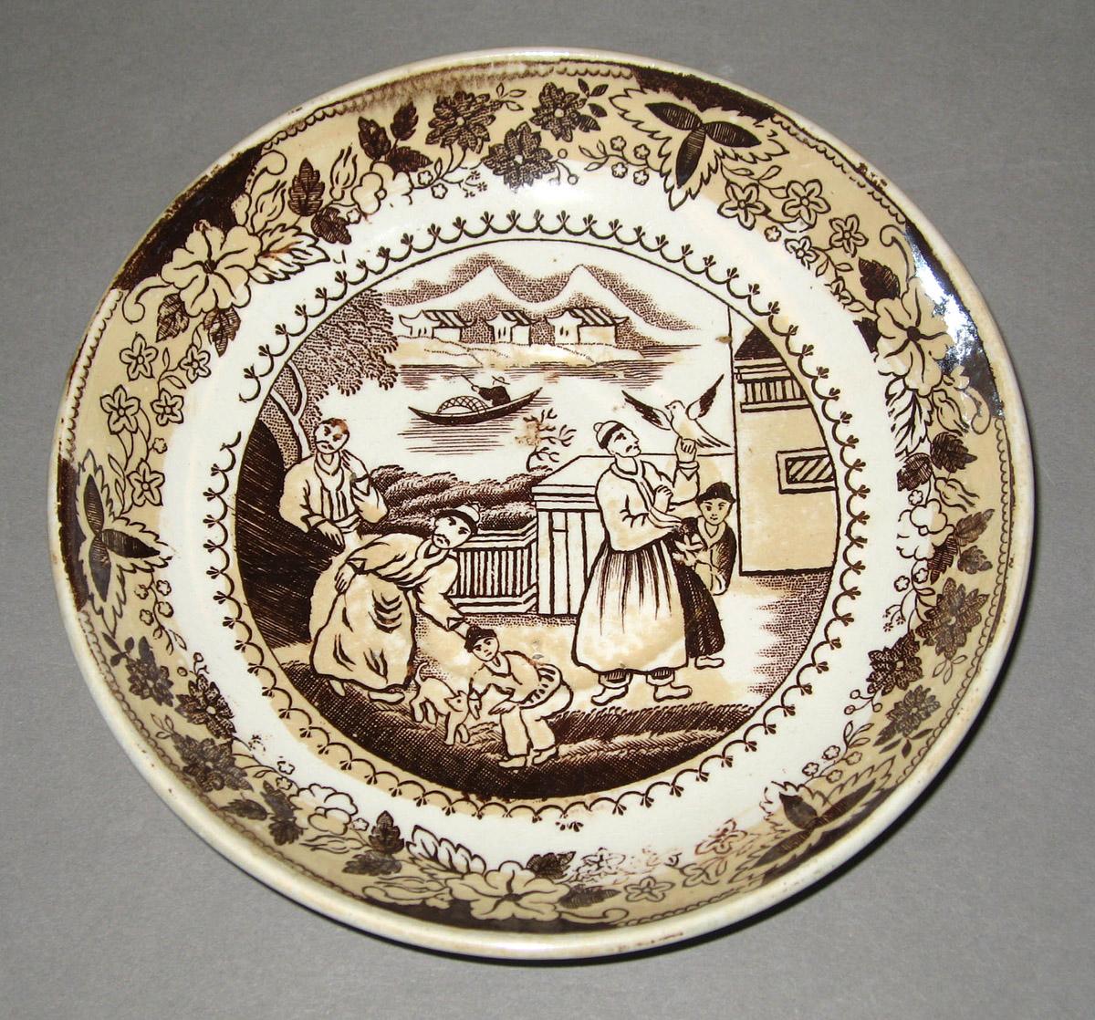 1976.0128 B Eathenware saucer