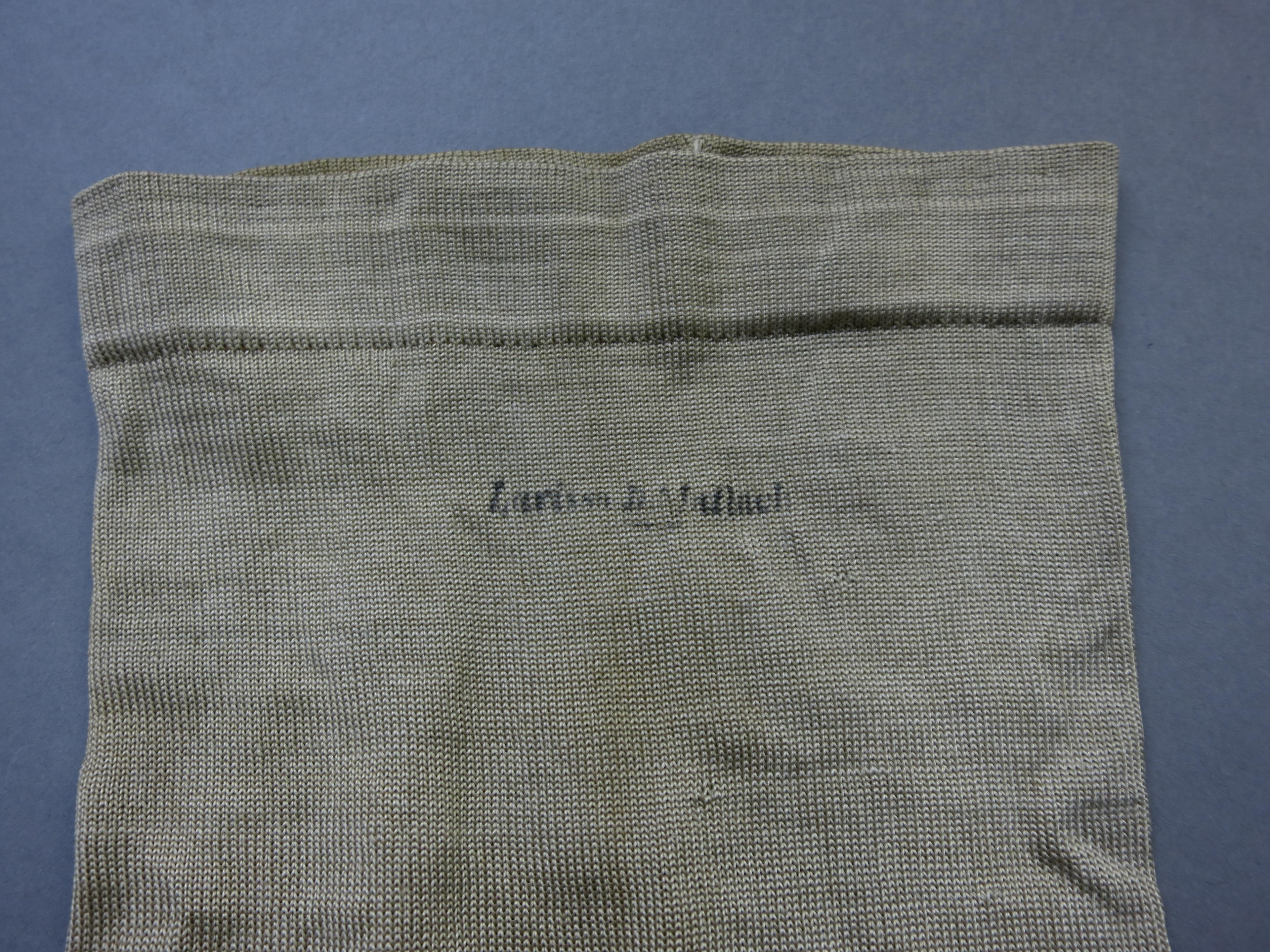 1976.0179 Stocking, Inscription