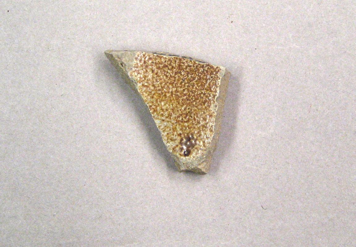 1976.0523.034 Ceramic fragment-underside