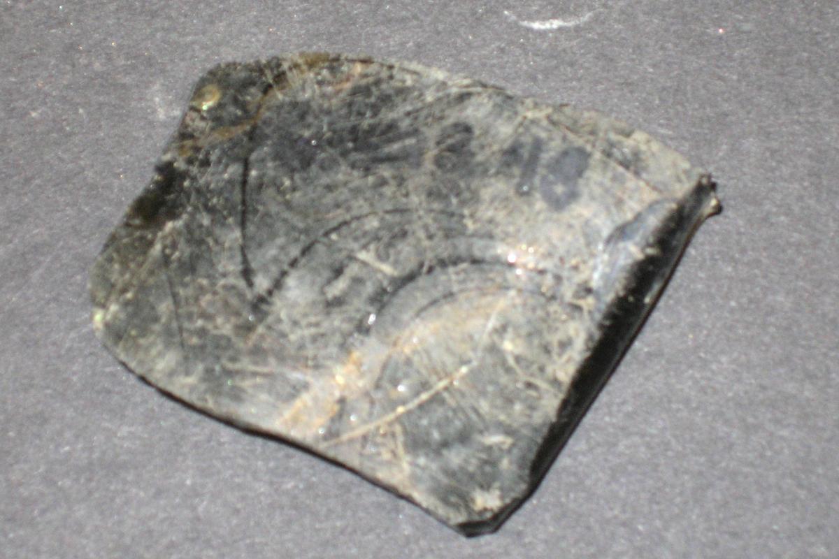 1976.0523.048 Glass Fragment (underside)