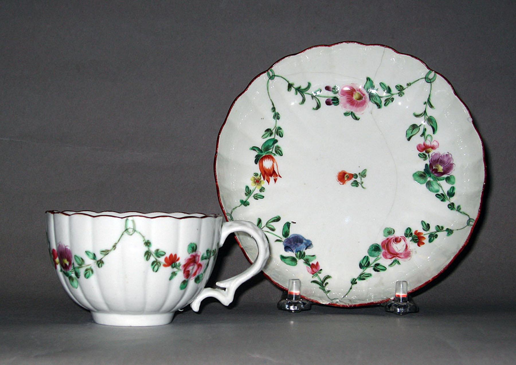 1977.0070 A, B Bristol hard-paste porcelain teacup and saucer
