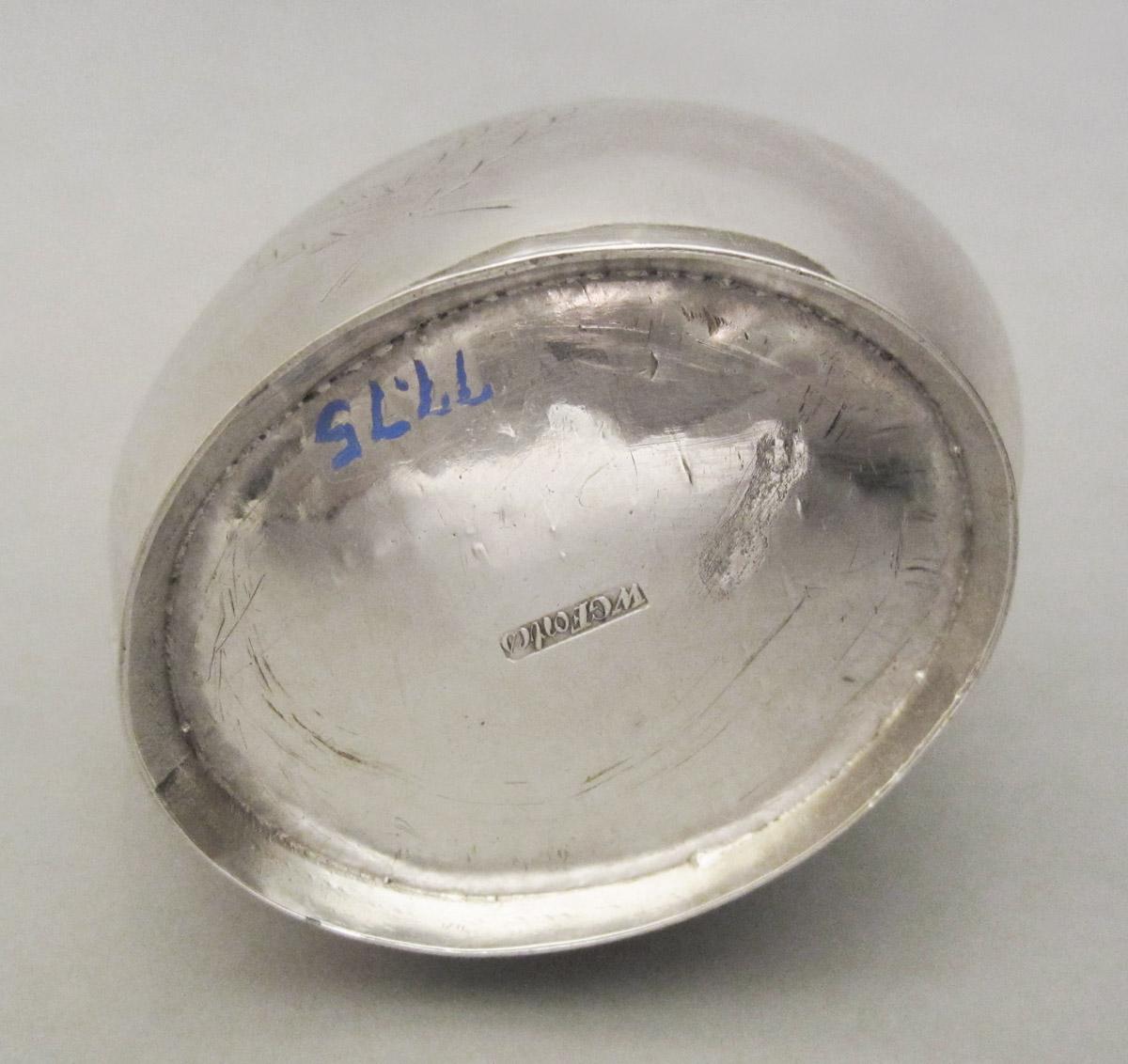 1977.0075 Pitcher, underside