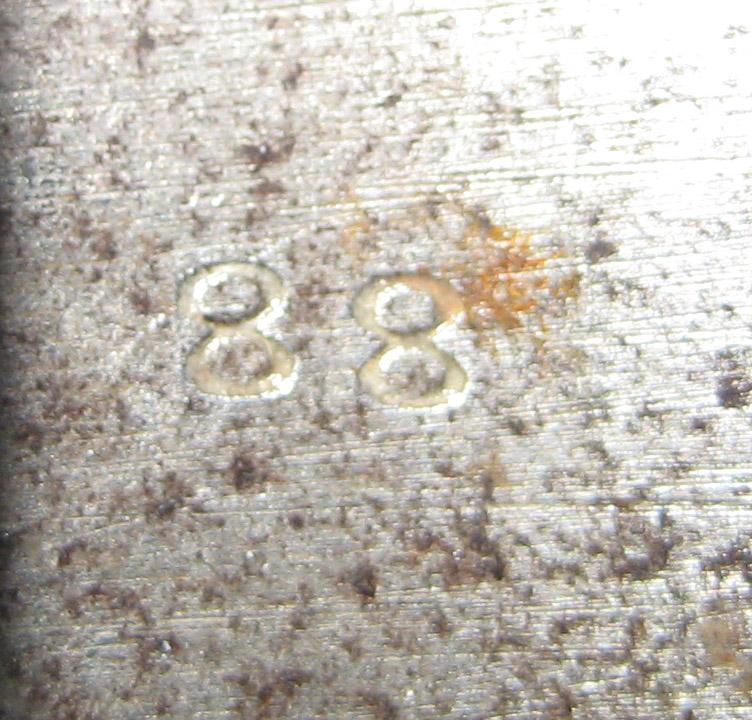 1977.0169.001 Buckle (mark)