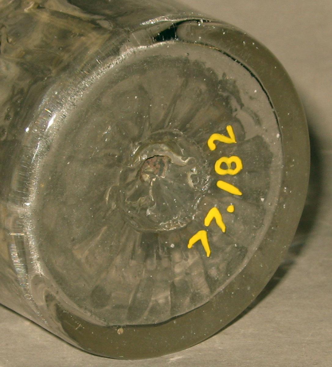1977.0182 Glass tumbler (underside)