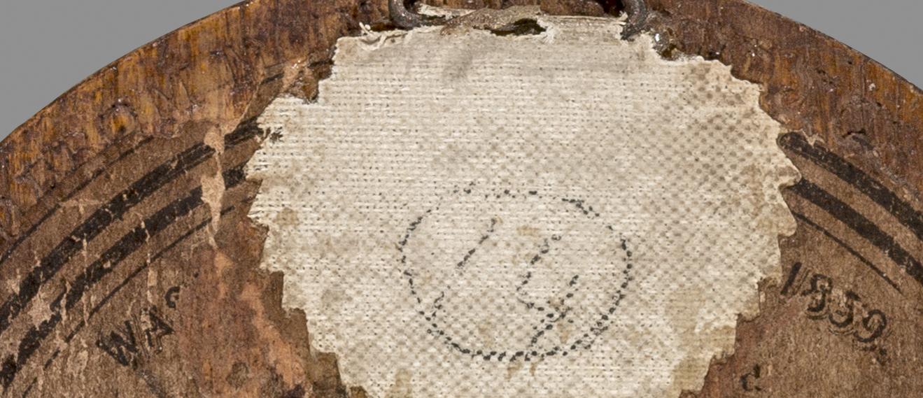 1977.0586 B Print mounted on wood, detail 1, reverse