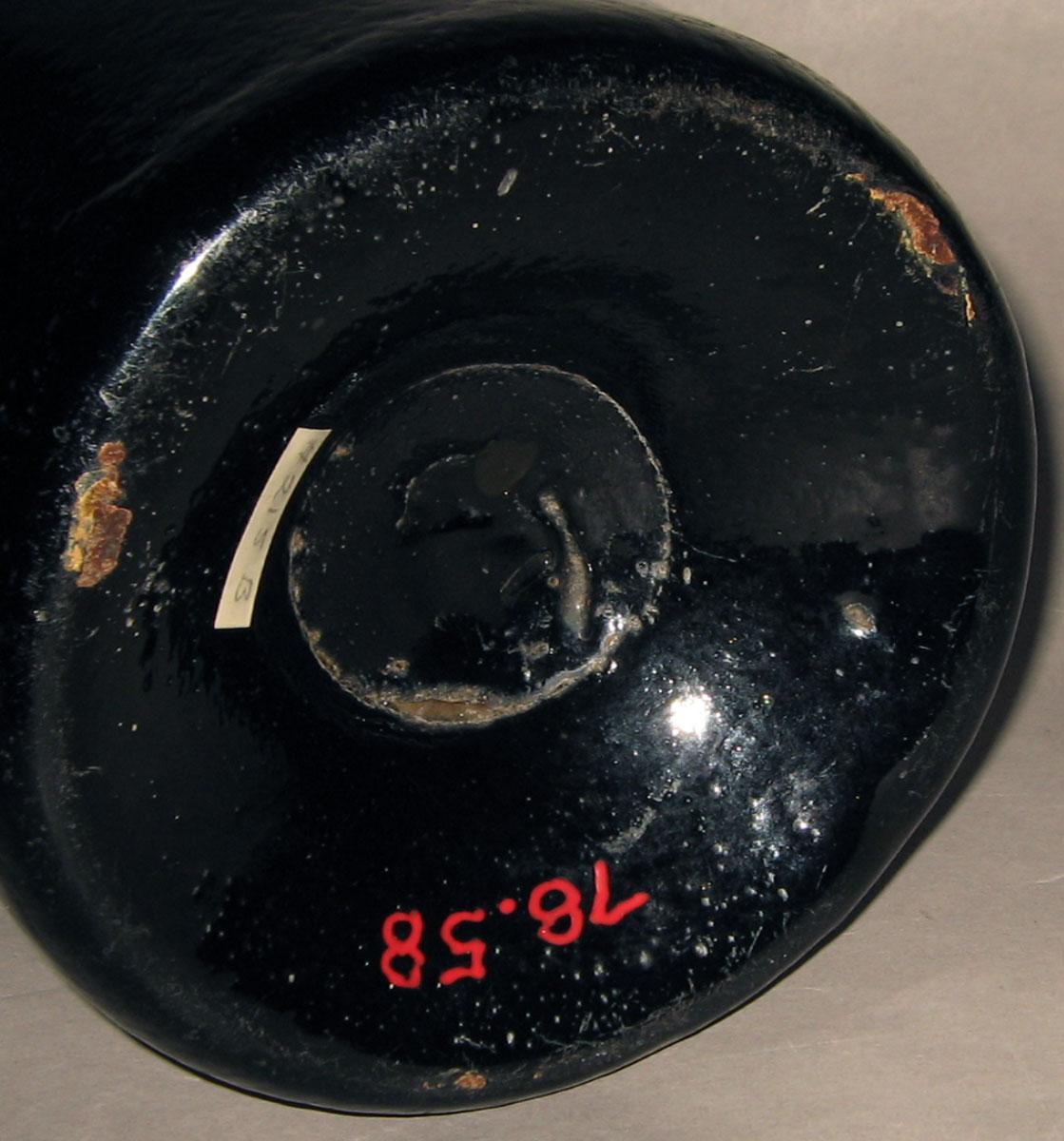 1978.0058 Glass wine bottle (underside)