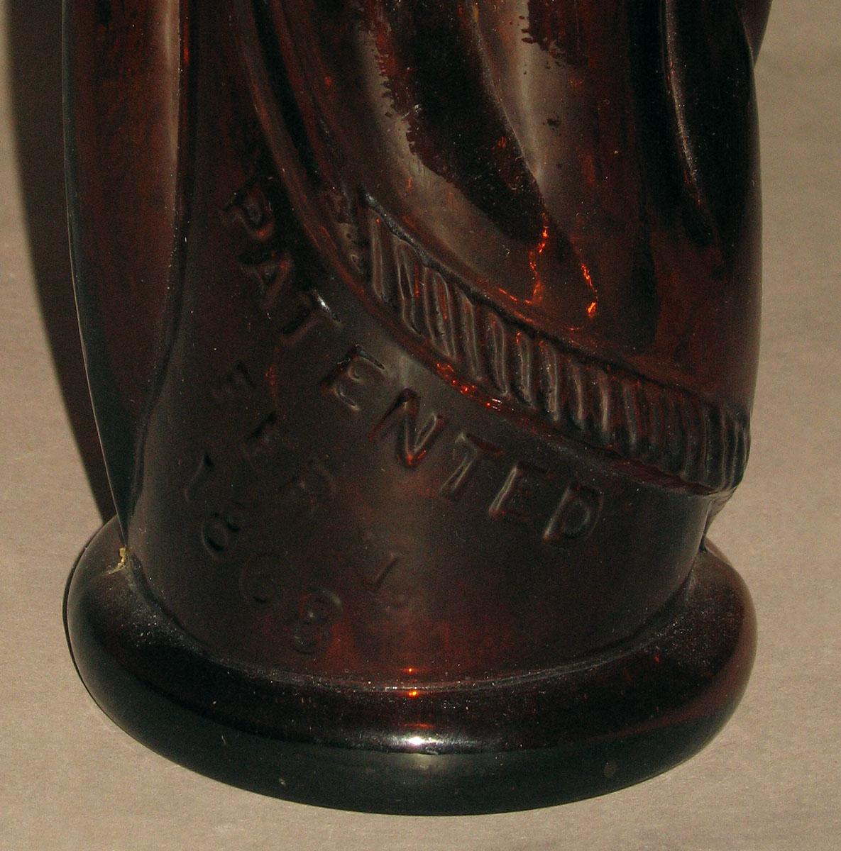 1978.0094.001 Glass Bitters Bottle (detail)
