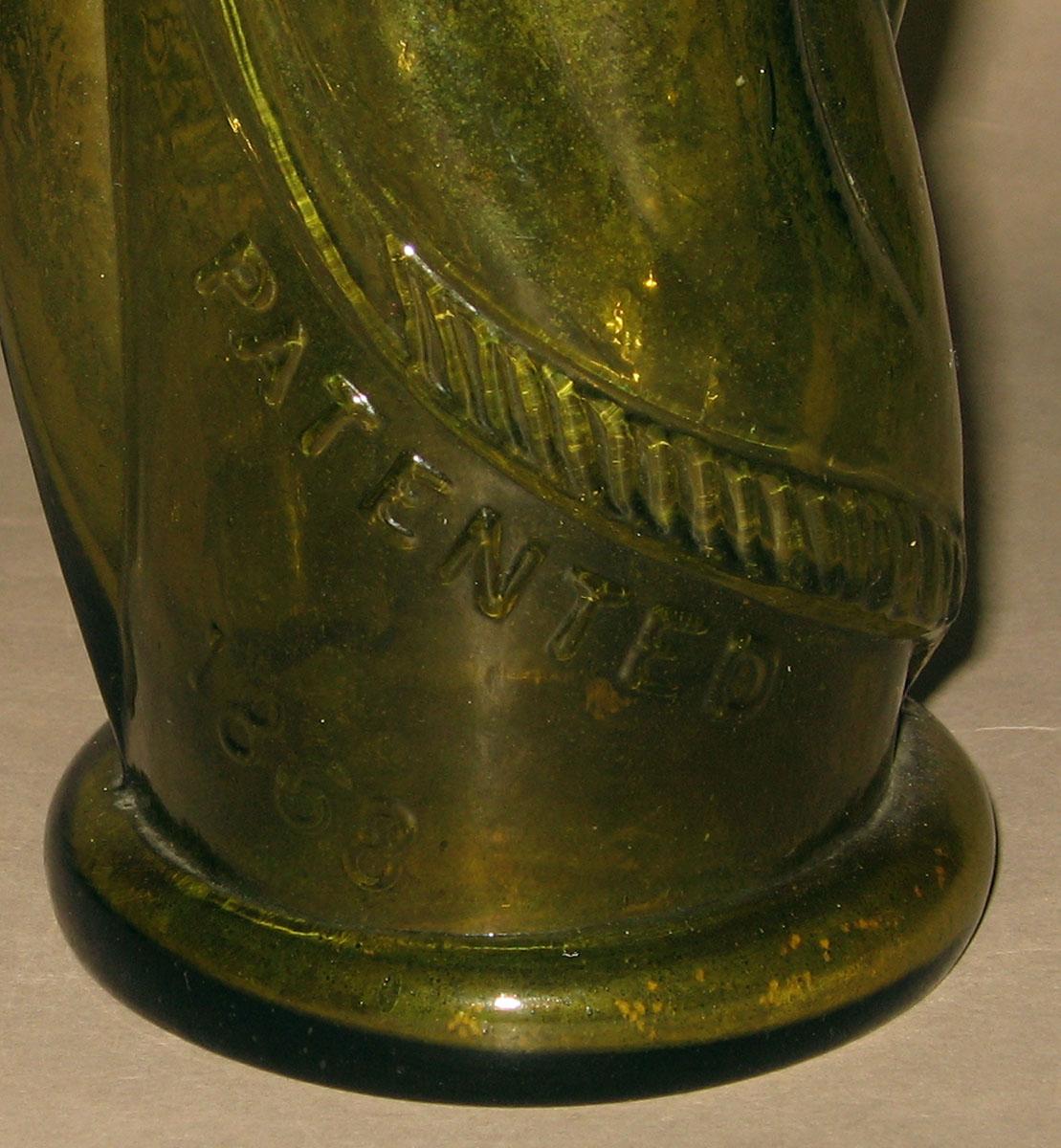 1978.0094.002 Glass bottle (detail)
