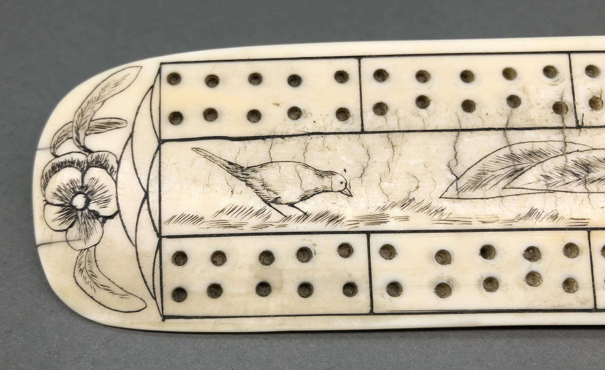 1978.0165 Cribbage board, Scrimshaw game board, view2 Obverse detail