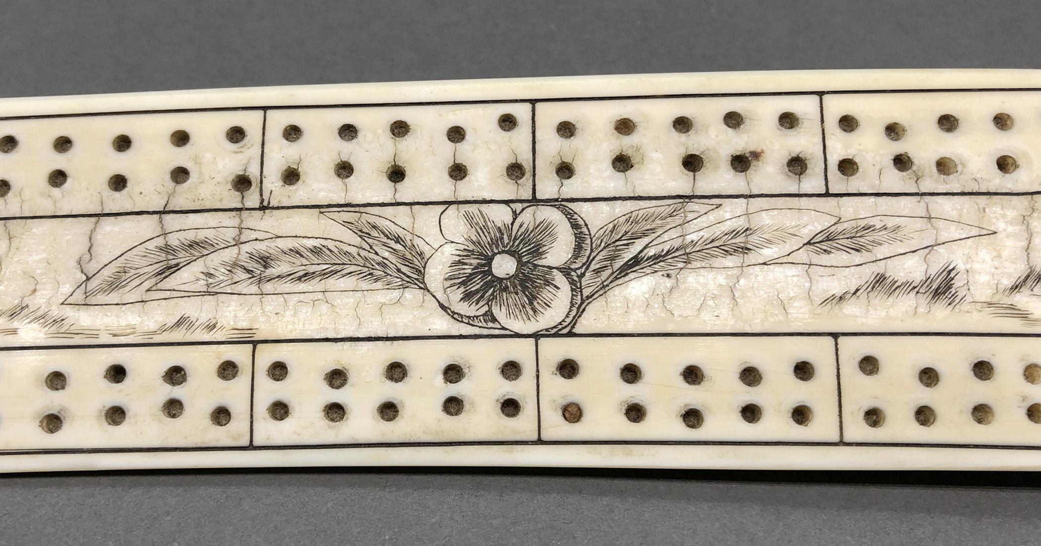 1978.0165 Cribbage board, Scrimshaw game board, view3 Obverse detail