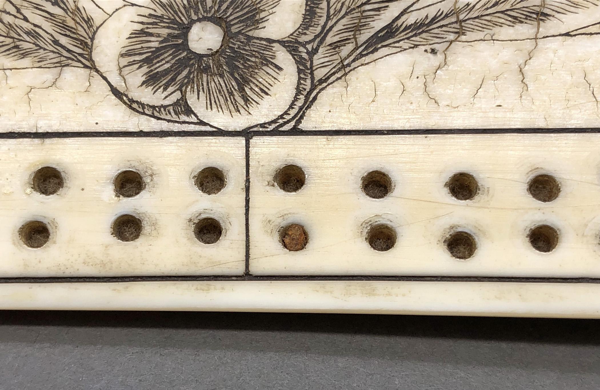 1978.0165 Cribbage board, Scrimshaw game board, view5 Obverse detail peg