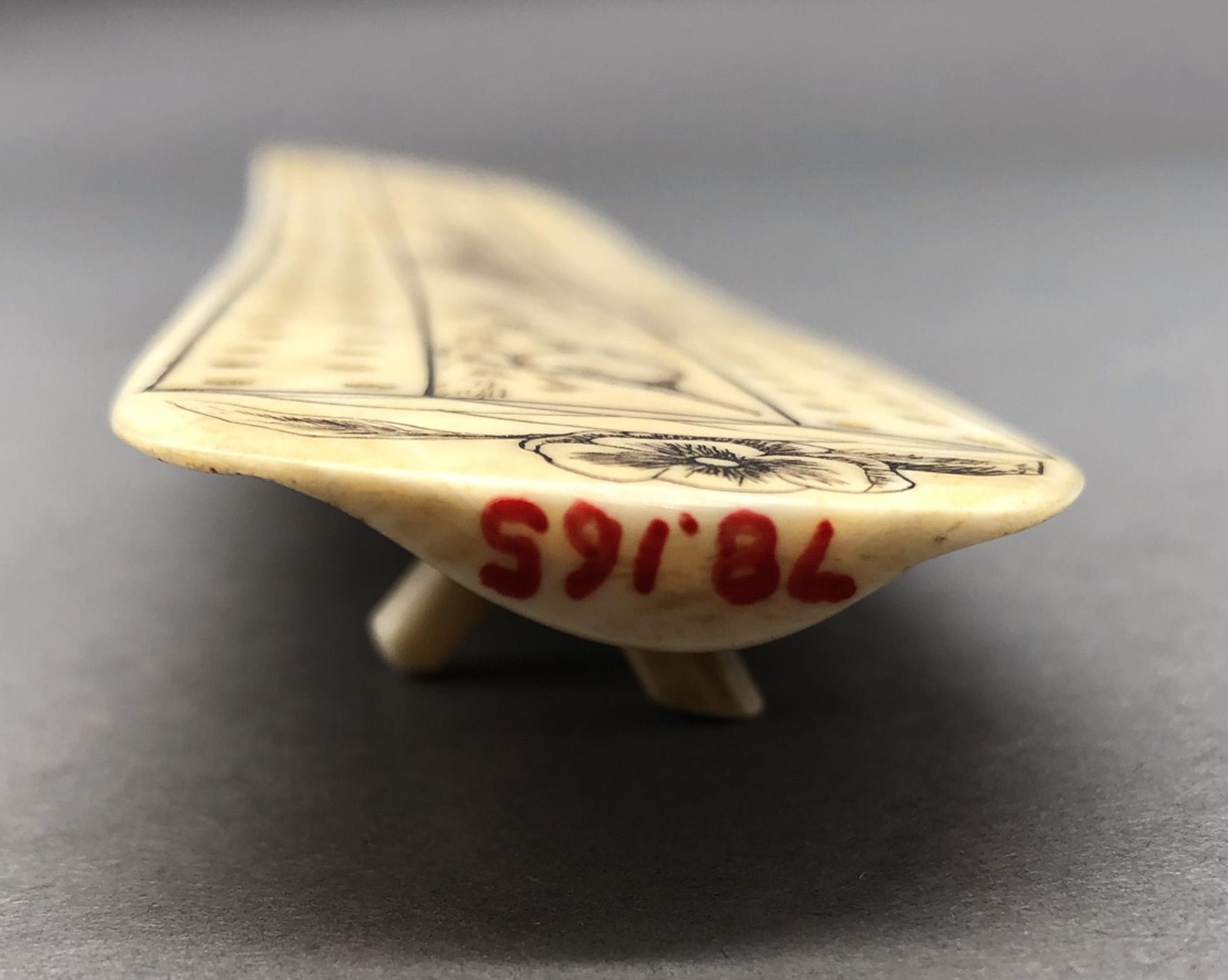 1978.0165 Cribbage board, Scrimshaw game board, view7 Obverse Side View legs