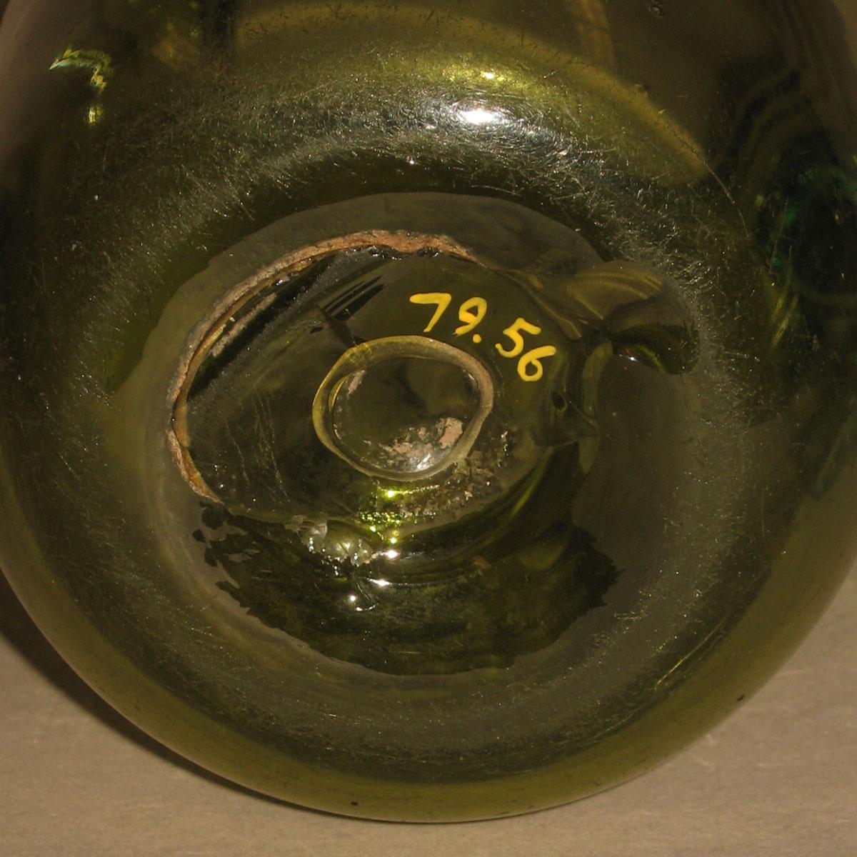 1979.0056 Glass jug (underside)