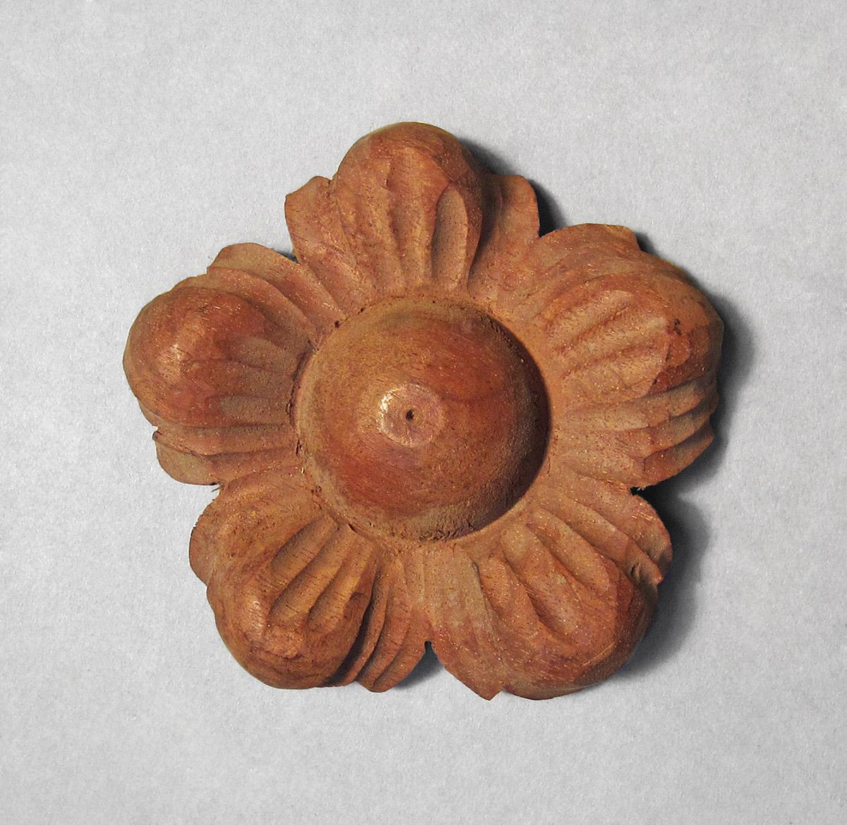1979.0066.025, Rosette, side 1