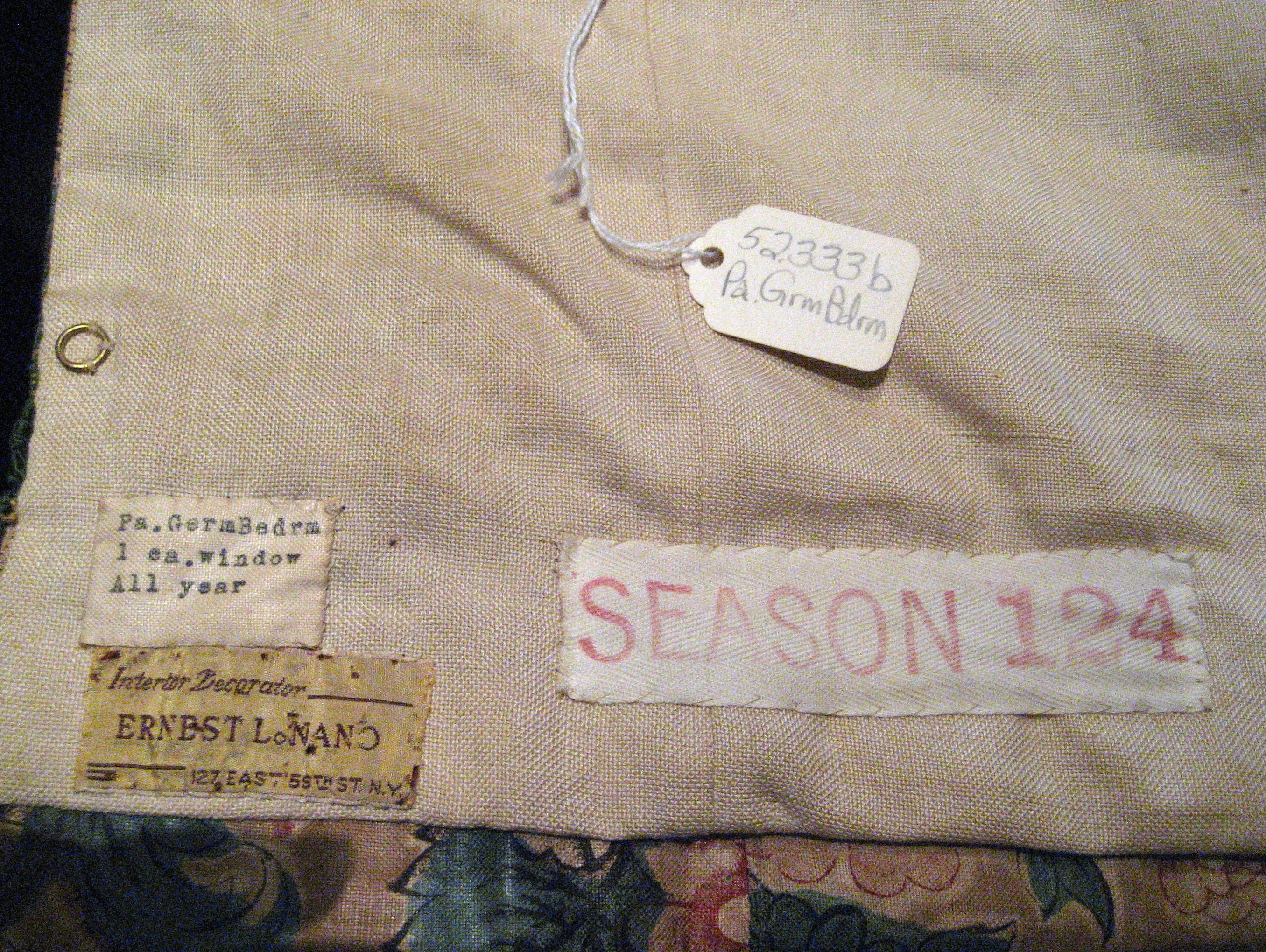 1952.0333 b side curtain  labels