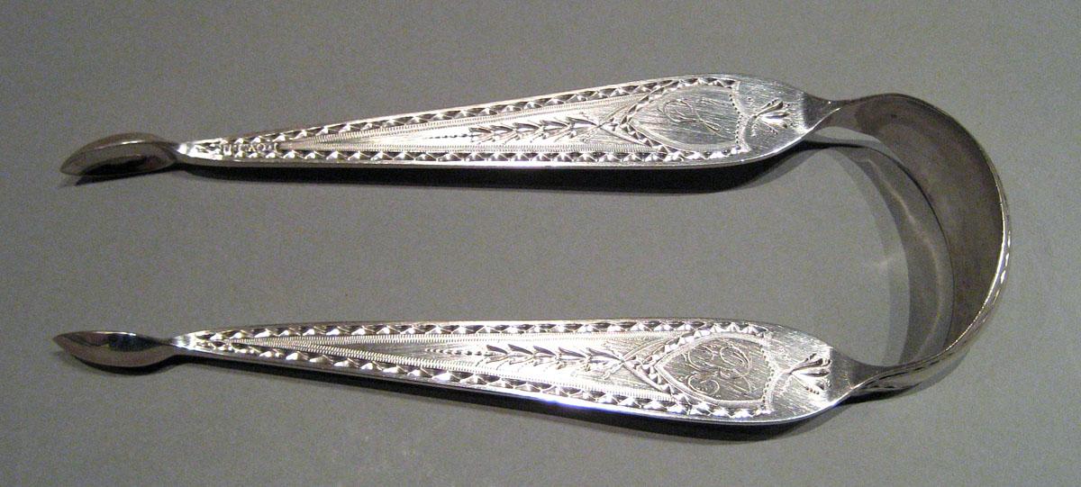 1979.0213 Silver Tongs upper surface