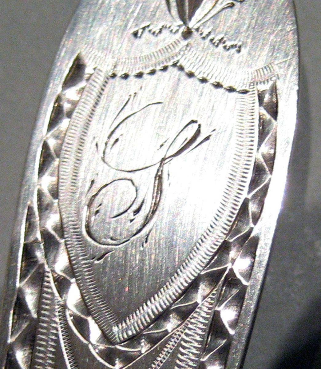 1979.0213 Silver Tongs engraving 2