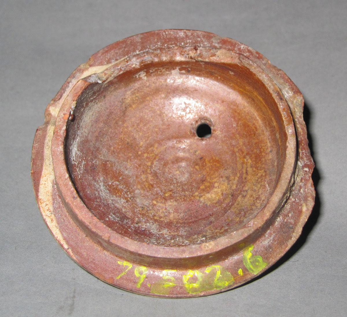 1979.0502.006 Redware teapot cover underside