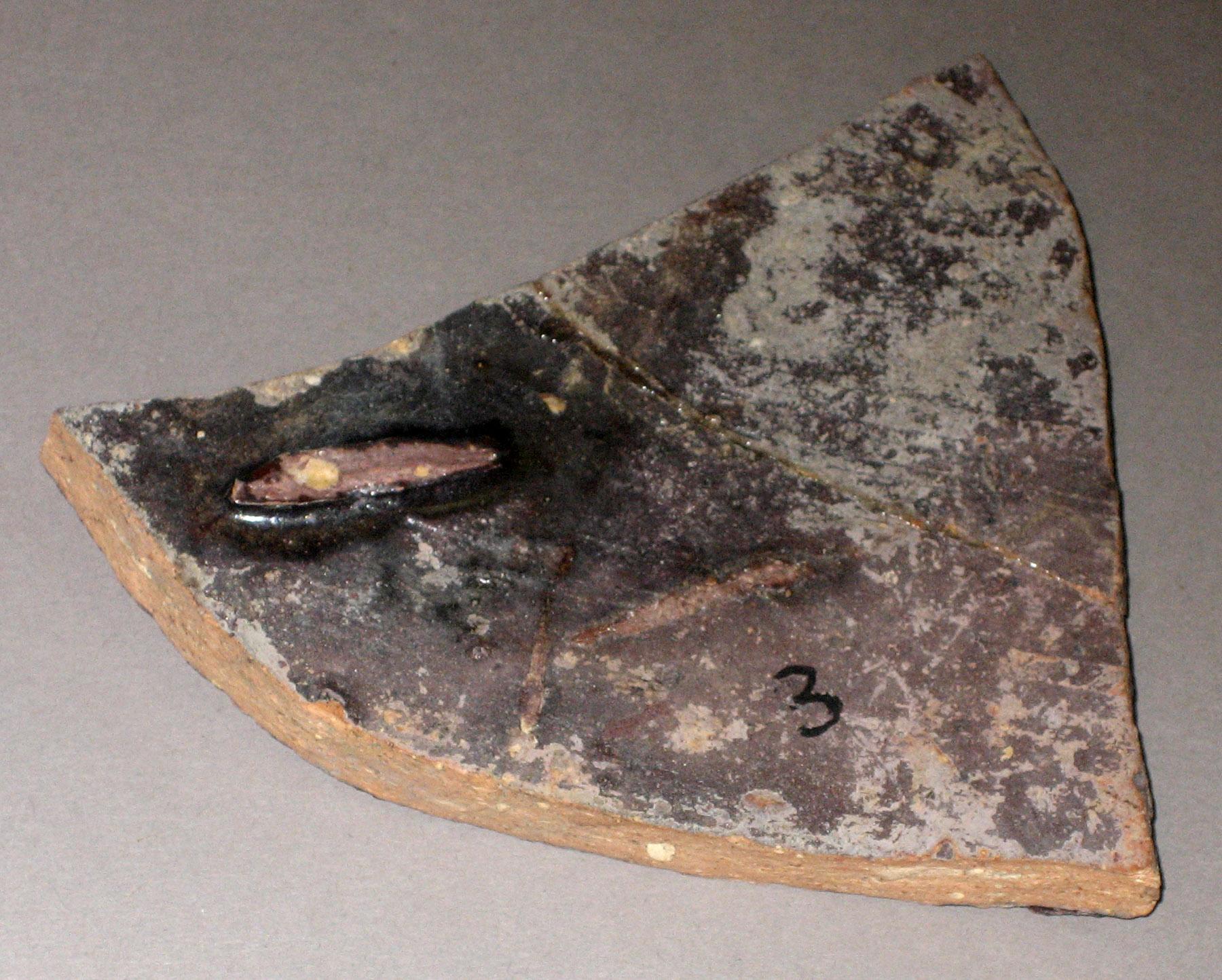 1979.0503.007 Slipware dish fragment (back)