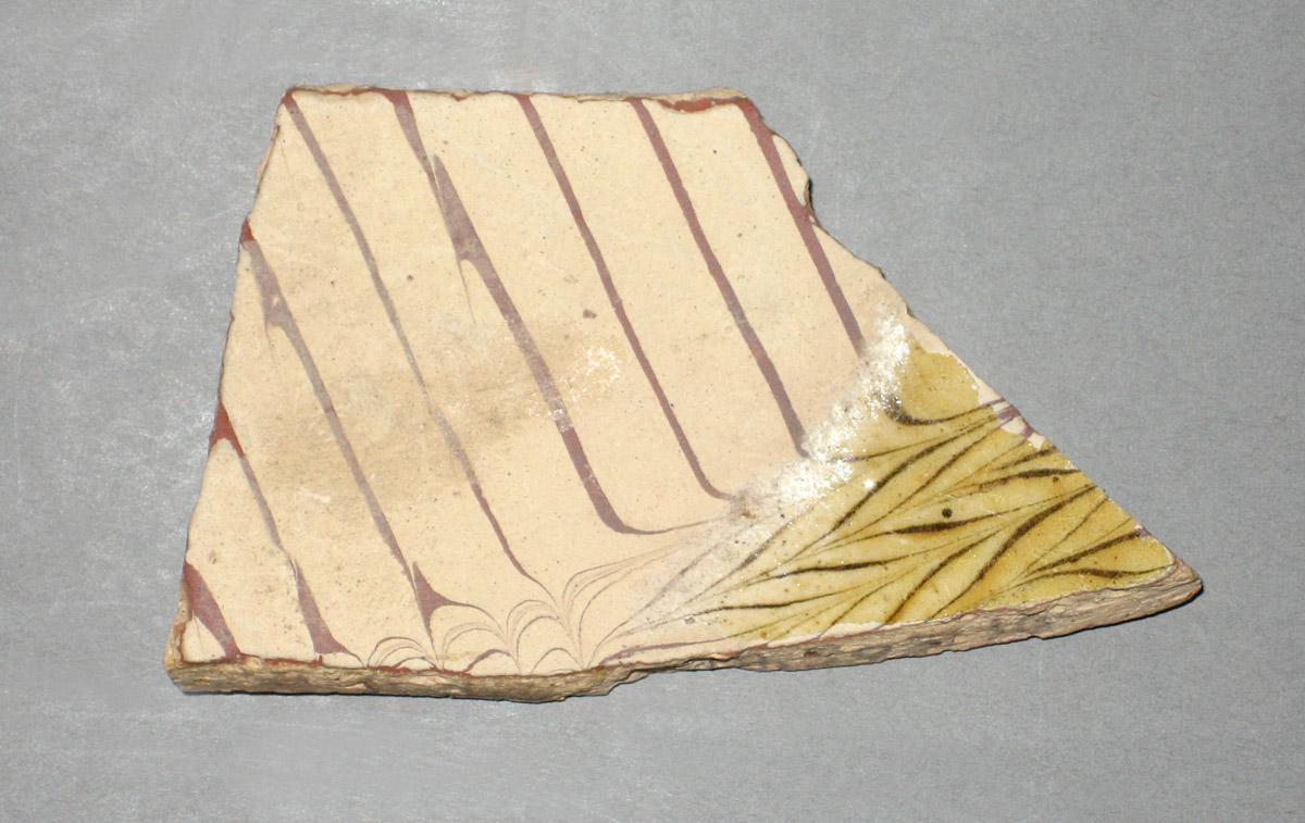 1979.0503.010 Ceramic fragment side1