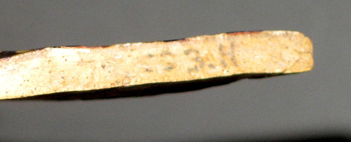 1979.0503.011 Ceramic fragment side