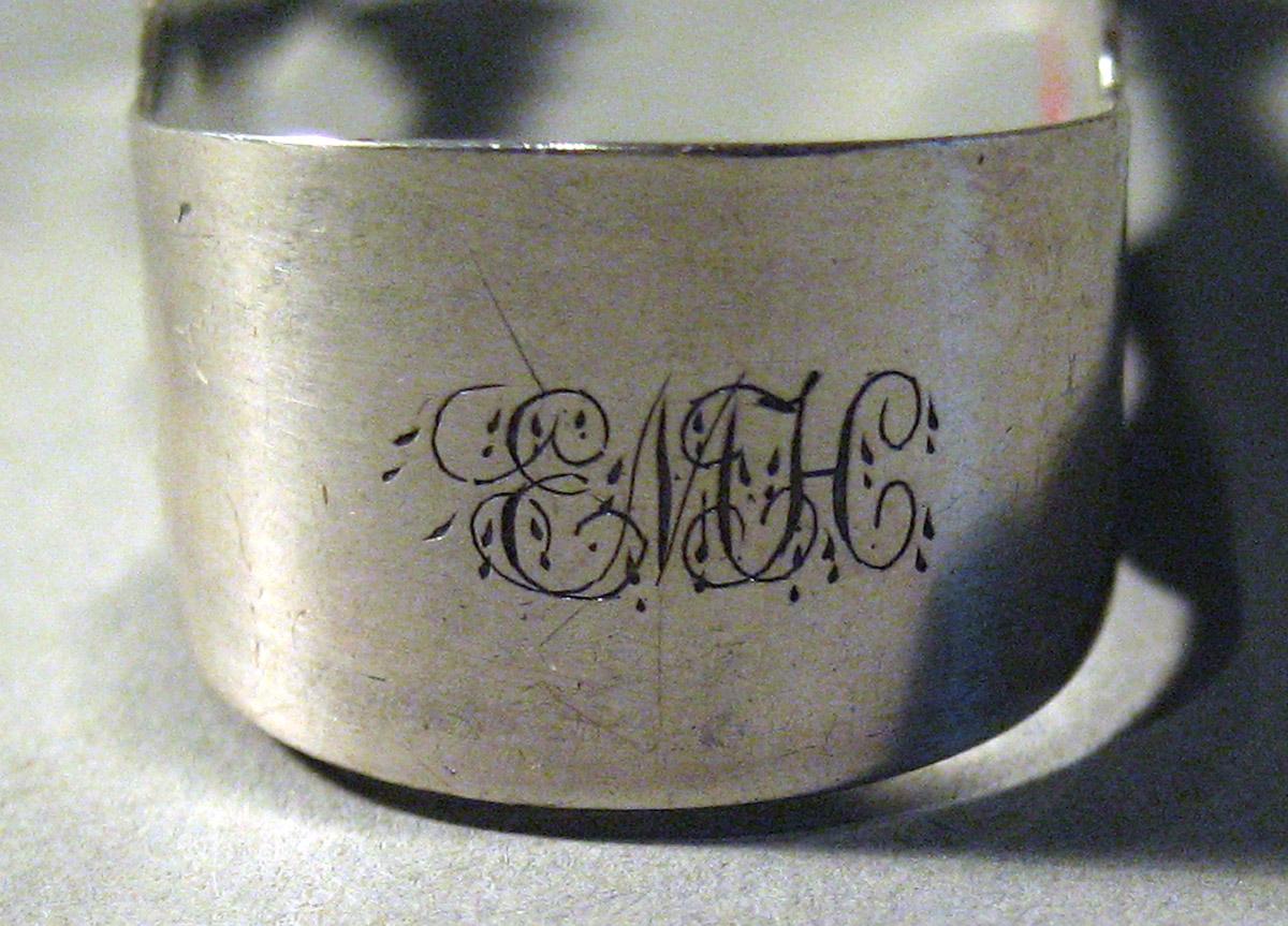 1980.0051 Silver Tongs engraving