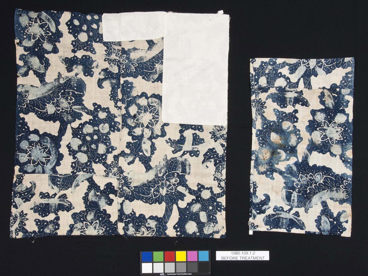 1980.0109.001 Textile, printed, reverse, .002 Textile, printed, reverse, before conservation treatment