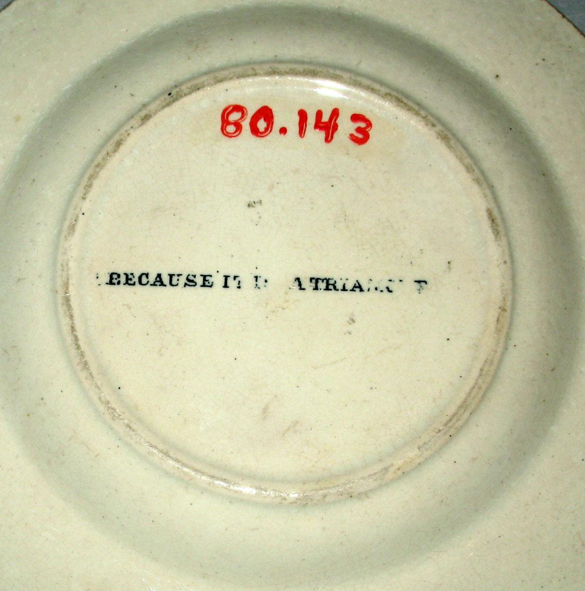 1980.0143 Child's plate with joke (back)