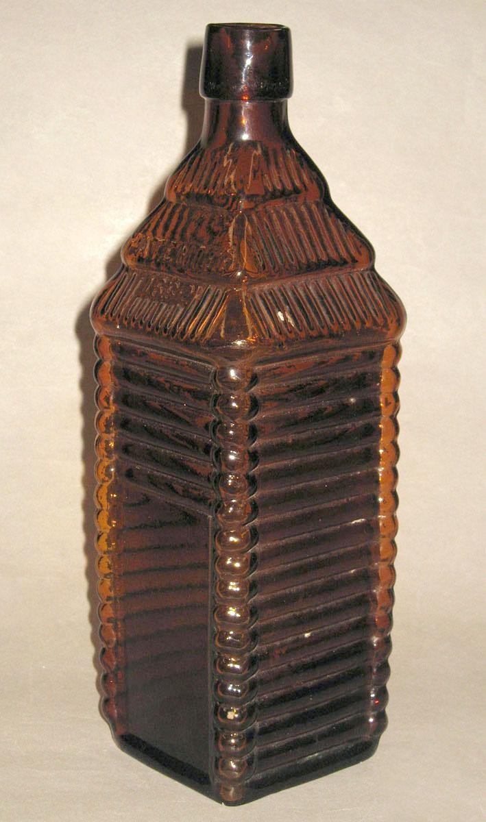 1980.0148 Glass bottle (op. side)