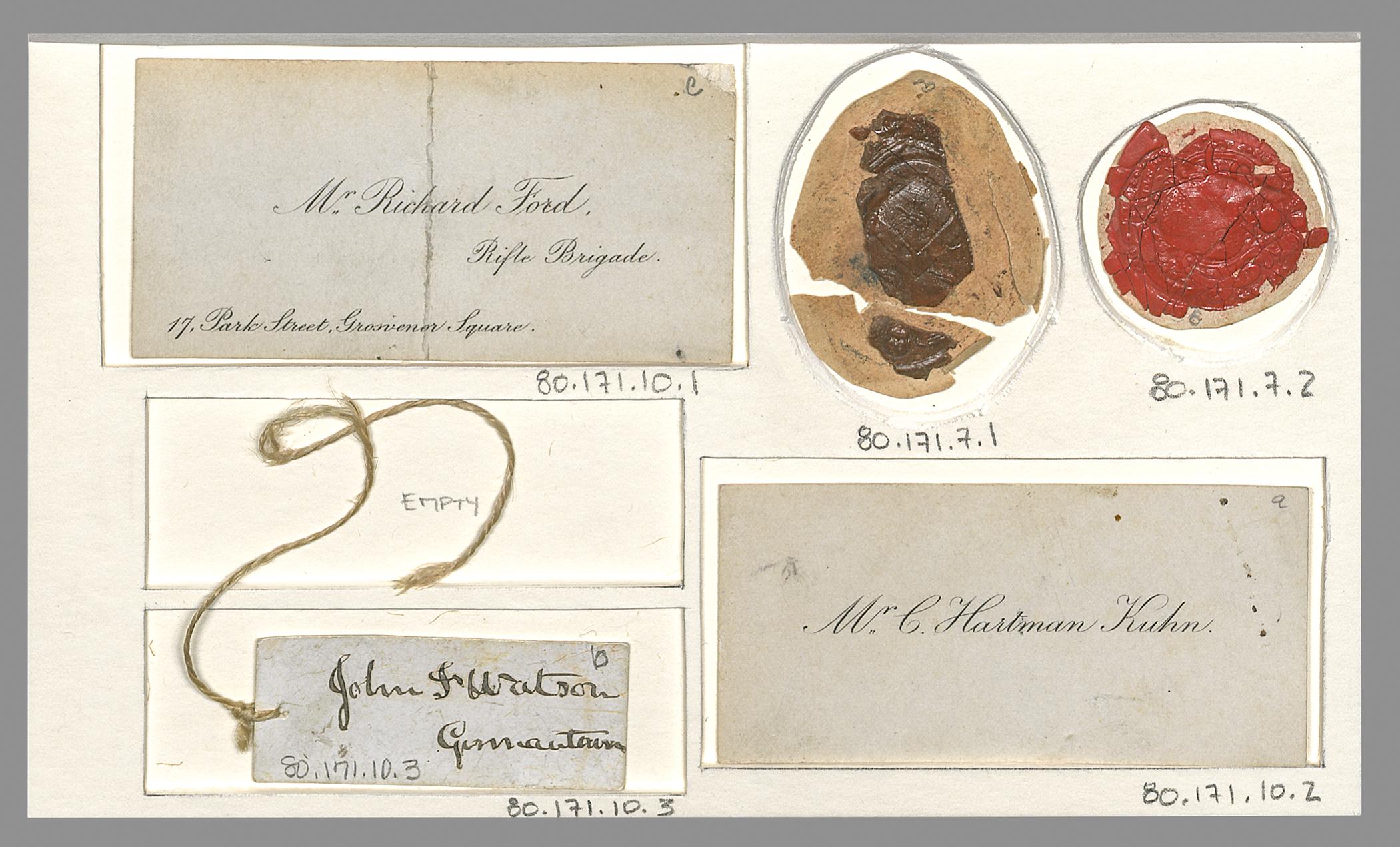 1980.0171.007.001, .002 Wax seal on paper (2), 1980.0171.010.001, .002 Card (2), .003 Tag